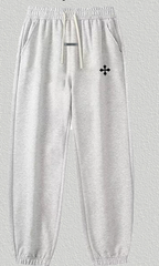 Fear of God Essentials Light Grey Joggers with Black Cross