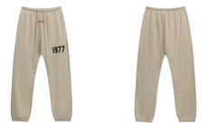 Fear of God Essentials Oatmeal Joggers with Black 1977 Graphic
