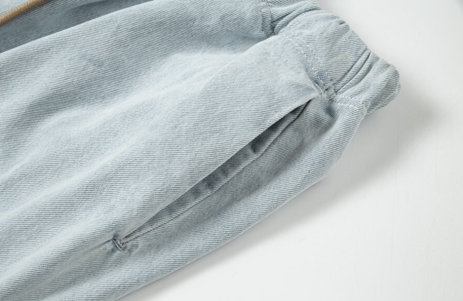 Fear of God Essentials Light Wash Denim Relaxed Pants