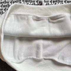 Fear of God Essentials Black White Allover Text Hoodie