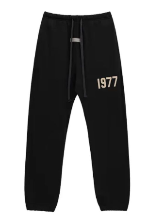 Fear of God Essentials Black Joggers with Beige 1977 Graphic