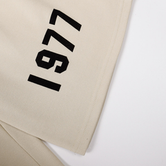 Fear of God Essentials Cream 1977 Flocked Shorts